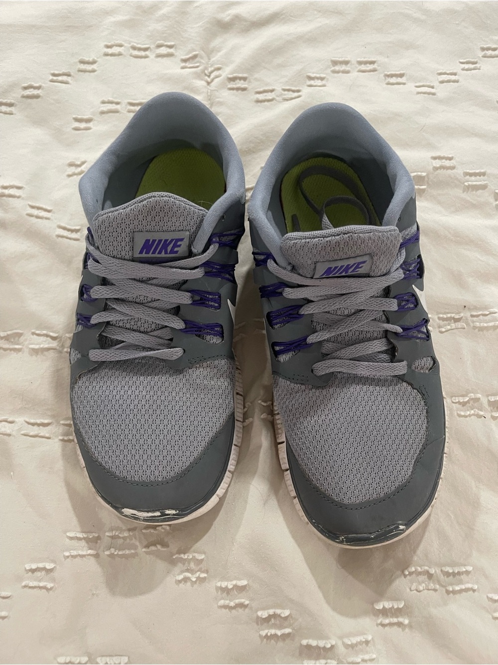 Nike Gray Sneakers with Purple Accents and Green Insole